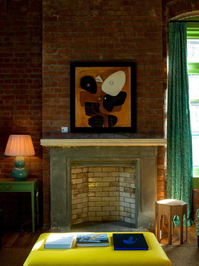 The Observatory Hotel Christchurch Luaran gambar A fireplace at the house